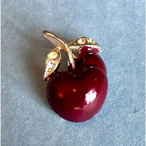 Sweet little vintage, cherry pin. All rhinestones present. A few scratch…